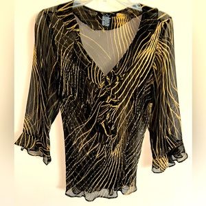 ECI NY feminine beaded see-through top size M with gold and beaded accents.